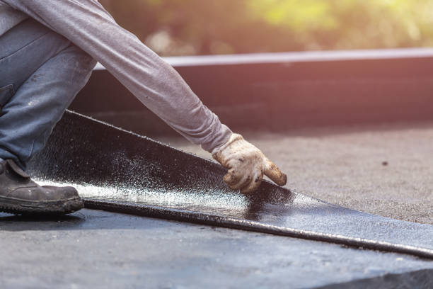 Professional Basement Waterproofing technician working in Lawrenceville, IL